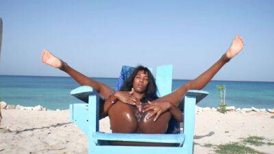 Ebony Latin Girl, Oil Skin And Public Orgasm On The Beach on coonylatina.com